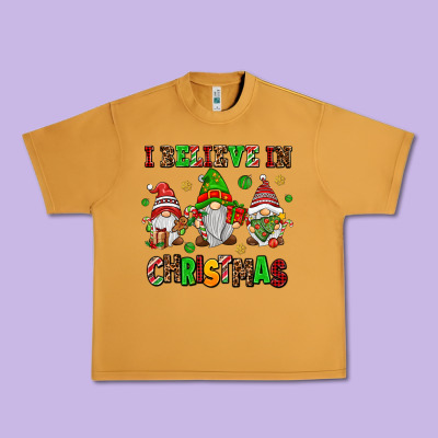 I Believe In Christmas Urban Heavy Tee Designed By Adodesignshop
