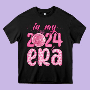 In My 2024 Era Heavy Core Tee Designed By Maliassmallbusiness