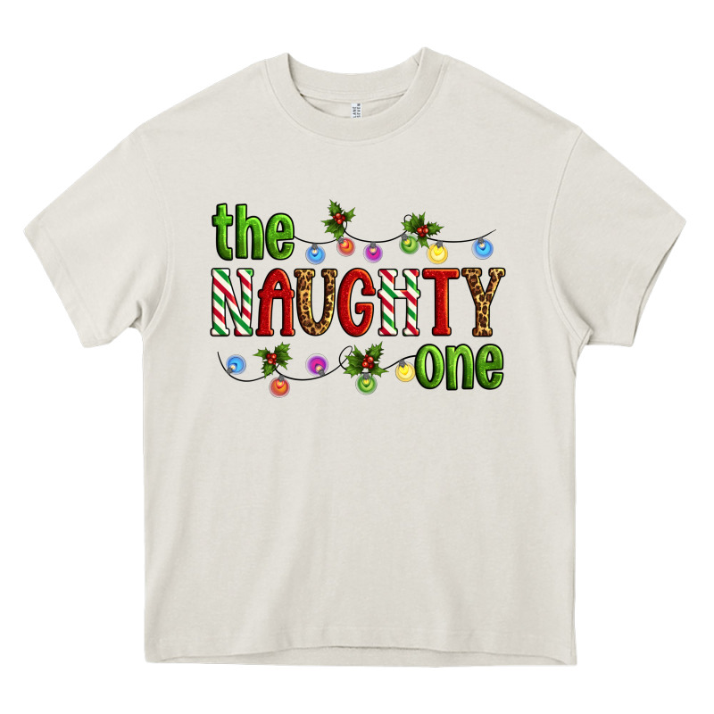 The Naughty One Christmas Heavy Core Tee by Artiststas | Teevron