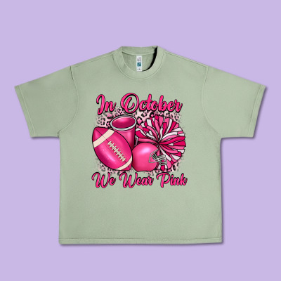 In October We Wear Pink Cheer With Football Breast Urban Heavy Tee Designed By Jahusdesignshop