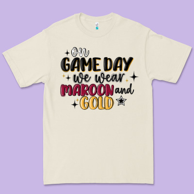 Premium Tee on game day we wear maroon and gold