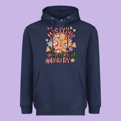 Mrs Claus Gingerbread Bakery Heavyweight Hoodie Designed By Maliassmallbusiness