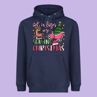 Get In Loser We're Slaying Christmas Heavyweight Hoodie Designed By Maliassmallbusiness