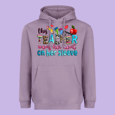 This Teacher Wears Her Her On Her Sleeve Heavyweight Hoodie Designed By Nancycooperartshop