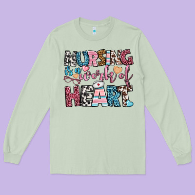 Nursing Is A Work Of Heart Long Sleeve Tee Designed By Bundleandbundleshop