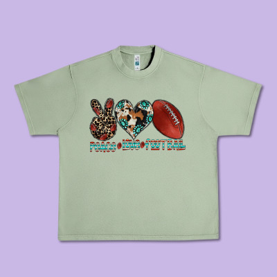 Peace Love Football Urban Heavy Tee Designed By Cowhidedigitalart