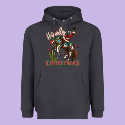 Howdy Christmas Cowboy Santa Heavyweight Hoodie Designed By Maliassmallbusiness