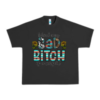 Pigment Black Behind Every Bad Bitch is a Carseat Urban Heavy Tee - CowhideDigitalArt