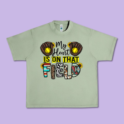 My Heart Is On That Field Urban Heavy Tee Designed By Cowhidedigitalart