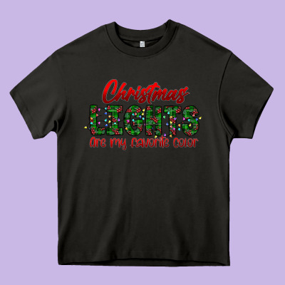 Festive Christmas Lights Text Art Heavy Core Tee Designed By Cowhidedigitalart