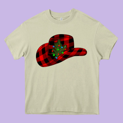 Cowboy Christmas Heavy Core Tee Designed By Cowhidedigitalart