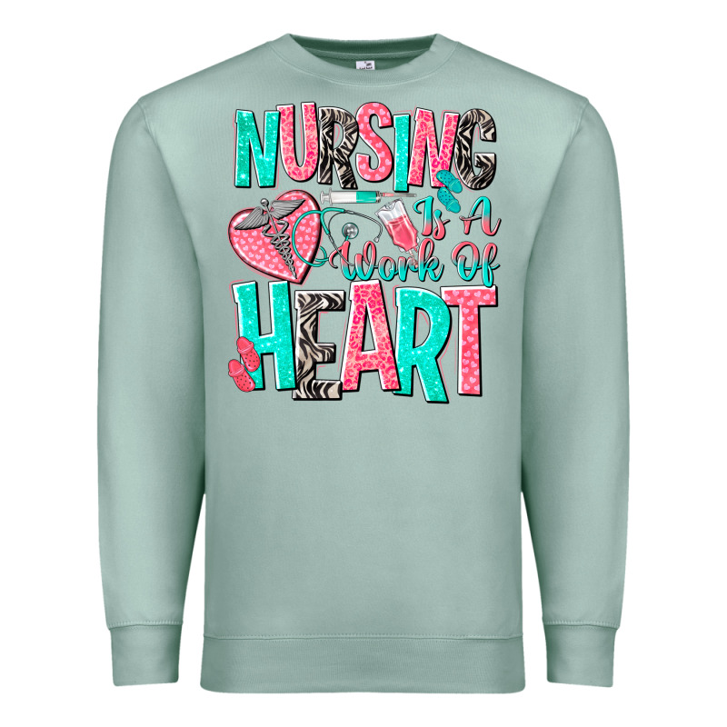 Nursing Is A Work Of Heart Premium Sweatshirt by NancyCooperArtShop | Teevron
