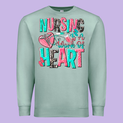 Nursing Is A Work Of Heart Premium Sweatshirt Designed By Nancycooperartshop