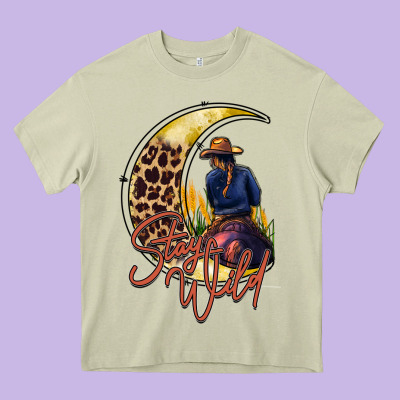 Stay Wild Moon Cowgirl Heavy Core Tee Designed By Racoondesign