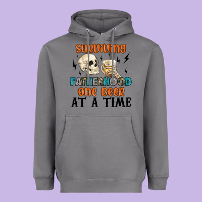 Surviving Fatherhood One Beer At A Time Heavyweight Hoodie Designed By Maliassmallbusiness