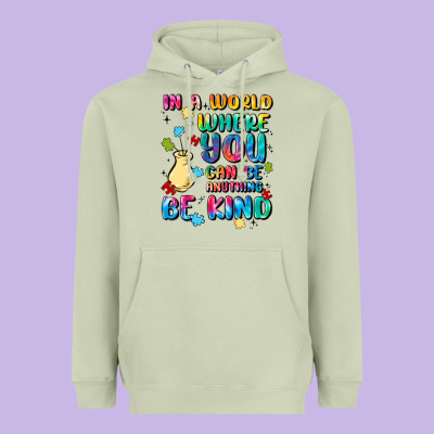 In A World Where You Can Be Anything Heavyweight Hoodie Designed By Maliassmallbusiness