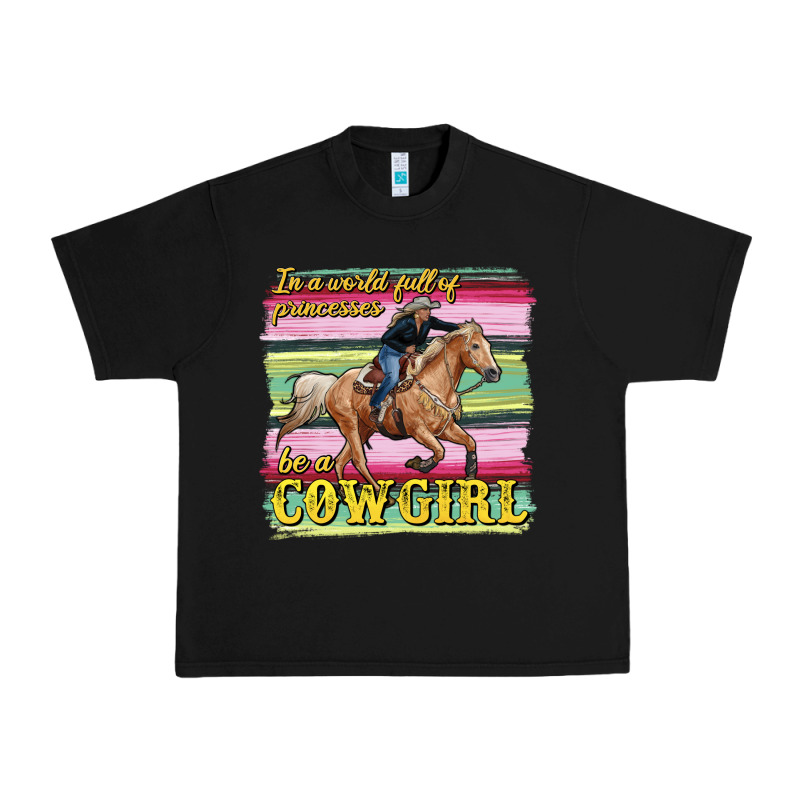 In A World Full Of Princesses Be A Cowgirl Urban Heavy Tee by RanaPortraitStore | Teevron