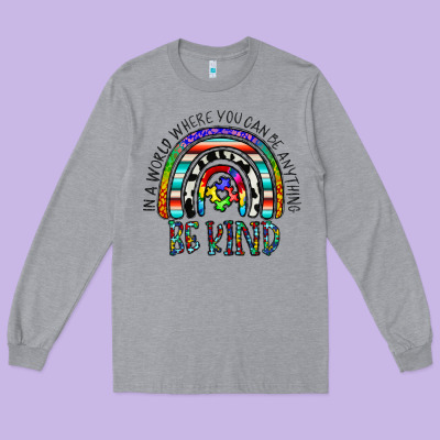 In A World Where You Can Be Anything Be Kind Long Sleeve Tee Designed By Cowhidedigitalart