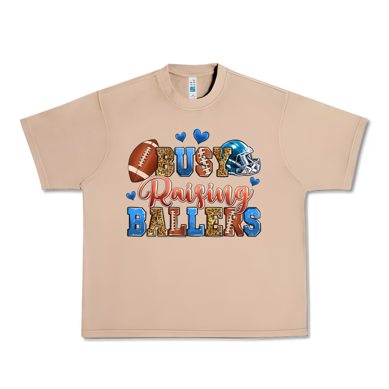 Busy Raising Ballers American Football Urban Heavy Tee by Zillion Design Studio | Teevron