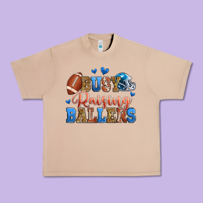 Busy Raising Ballers American Football Urban Heavy Tee Designed By Zillion Design Studio