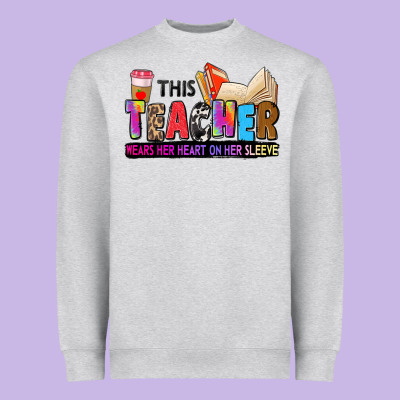 This Teacher Wears Her Heart On Her Sleeve Heavyweight Sweatshirt Designed By Zillion Design Studio