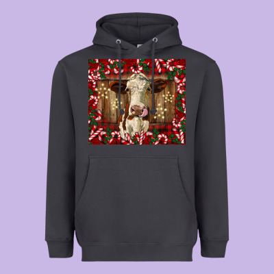 Christmas Heifer With Candy Canes Heavyweight Hoodie Designed By Barkaloodesign