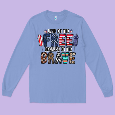 Land Of The Beacause Of The Brave Long Sleeve Tee Designed By Cowhidedigitalart