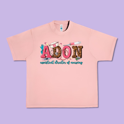 Assistant Director Of Nursing Urban Heavy Tee Designed By Texasbilliewilder