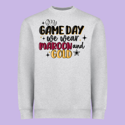 Heavyweight Sweatshirt on game day we wear maroon and gold