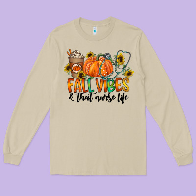 Fall Vibes And That Nurse Life Long Sleeve Tee Designed By Cowhidedigitalart
