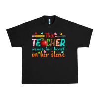 Black this teacher wears her heart on her sleeve Urban Heavy Tee - texasbilliewilder