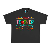 Pigment Black this teacher wears her heart on her sleeve Urban Heavy Tee - texasbilliewilder