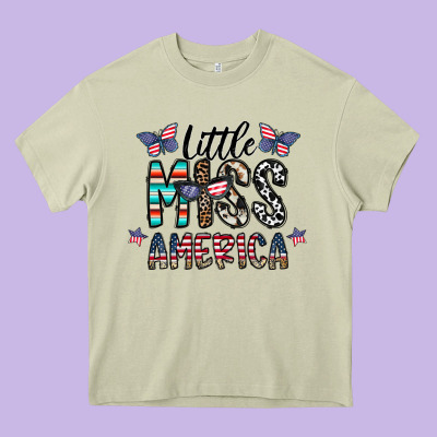 Little Miss America Heavy Core Tee Designed By Cowhidedigitalart