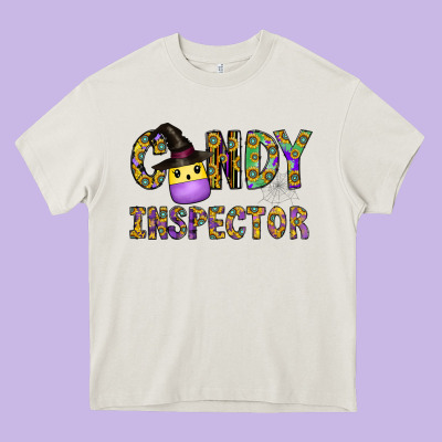 Candy Inspector Heavy Core Tee Designed By Cowhidedigitalart