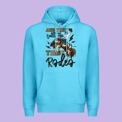 And They Call The Thing Rodeo Cowboy Premium Hoodie Designed By Maliassmallbusiness