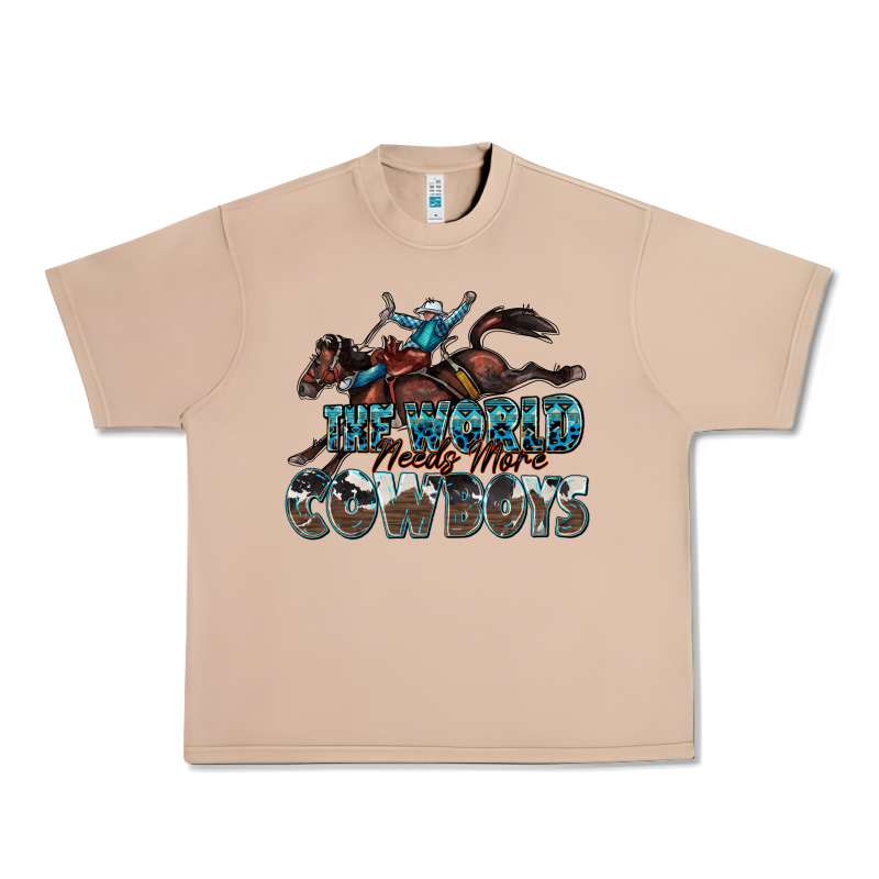 The World Needs More Cowboys Urban Heavy Tee by Zillion Design Studio | Teevron