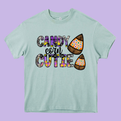 Candy Corn Cutie Heavy Core Tee Designed By Cowhidedigitalart