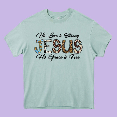 His Love Is Strong Jesus His Grace Is Free Heavy Core Tee Designed By Cowhidedigitalart