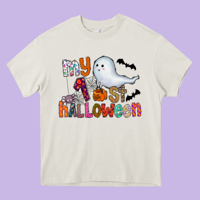 My 1st Halloween Heavy Core Tee Designed By Cowhidedigitalart