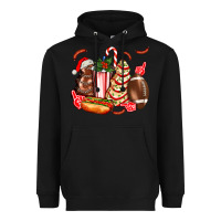 Black Christmas tree cake American football  ball and hot dogs ado Heavyweight Hoodie - AdoDesignShop