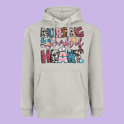 Nursing Is A Work Of Heart Heavyweight Hoodie Designed By Bundleandbundleshop