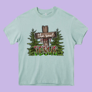 The Real Gift Is Jesus Heavy Core Tee Designed By Cowhidedigitalart