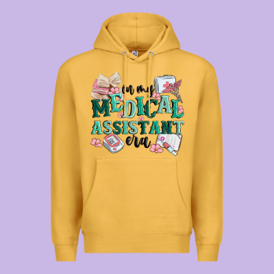 In My Medical Assistant Era Premium Hoodie Designed By Maliassmallbusiness