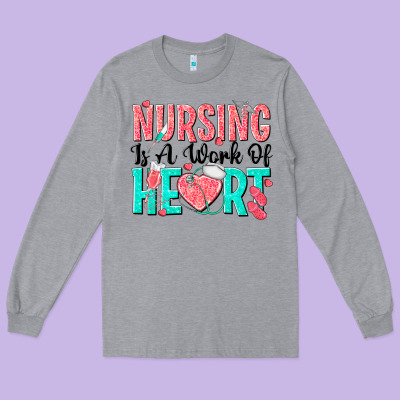 Nursing Is A Work Of Heart Long Sleeve Tee Designed By Texasbilliewilder