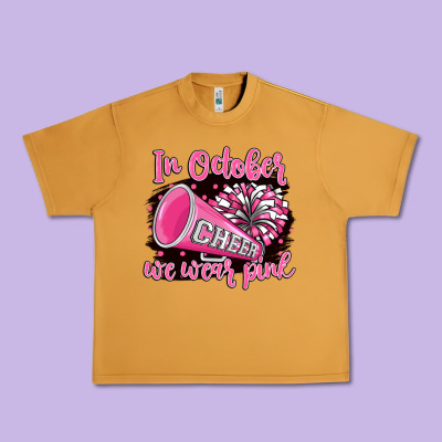 In October We Wear Pink Cheer Urban Heavy Tee Designed By Barkaloodesign