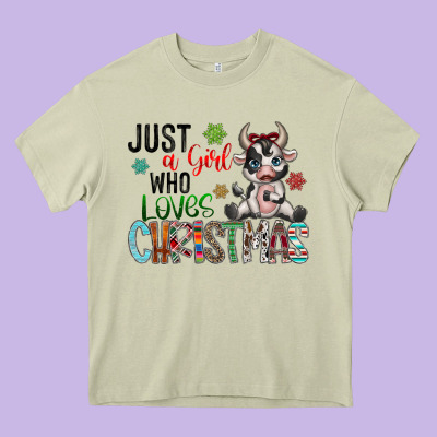 Just A Girl Who Loves Christmas Heavy Core Tee Designed By Cowhidedigitalart