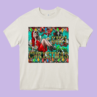 Just A Girl Who Loves Christmas Heavy Core Tee Designed By Cowhidedigitalart