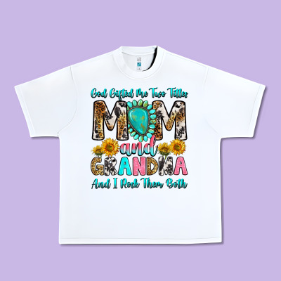 God Gifted Me Two Titles Mom And Grandma And I Roc Urban Heavy Tee Designed By Ranaportraitstore