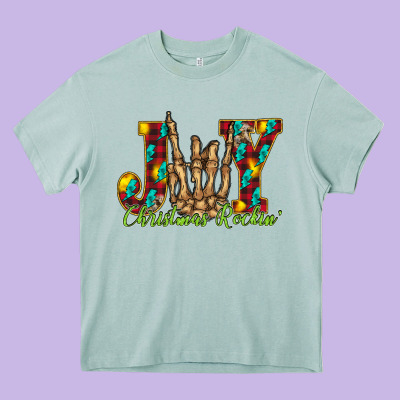 Joy Christmas Rockin Heavy Core Tee Designed By Cowhidedigitalart