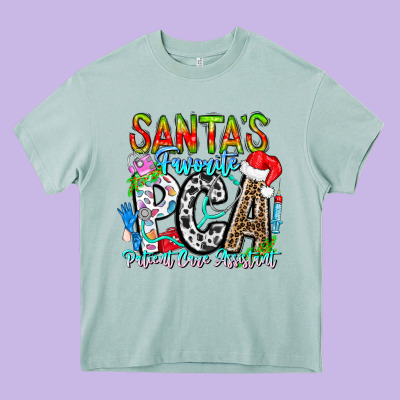 Santas Favorite Pca Patient Care Assistant Heavy Core Tee Designed By Cowhidedigitalart